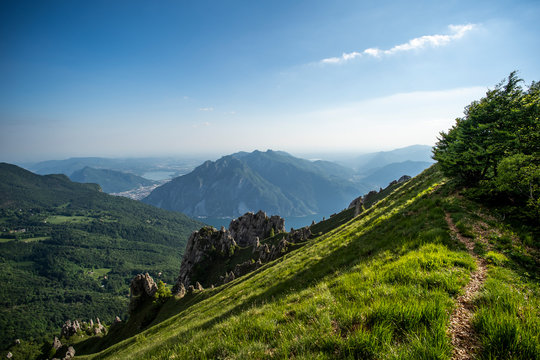 Scenic view of Grignetta mountain range against blue sky, European Alps, Lecco, Italy