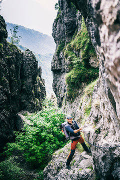 Mountaineer climbing on via ferrata, Orobie, European Alps, Como, Italy