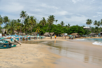 colorful fishing boats on the beach, Arugam Bay, Sri Lanka