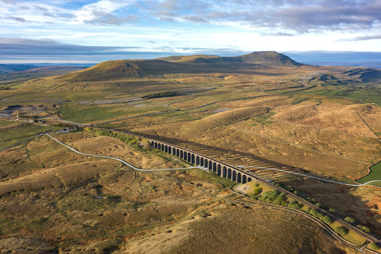 Aerial of The Ribblehead Viaduct a Grade II listed structure, the Viaduct runs the Settle to Carlisle railway route in North Yorkshire, England.