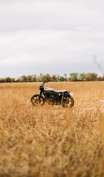 Caf&radic;&copy; racer parked wild Italy countryside