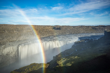 Dettifoss Waterfall with Rainbow, north Iceland