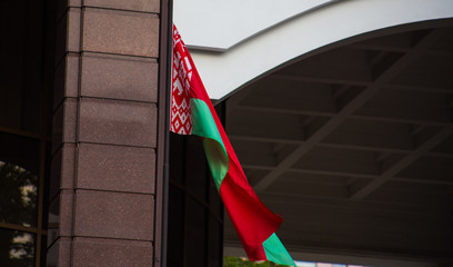 Red-green two-color flag of belarus waving on a flagpole