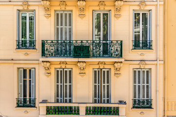 Obraz premium French old house with original design of balconies and windows. Nice, Cote d'Azur, France.