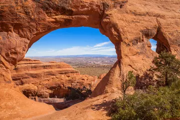 Tuinposter Partition Arch, one of over 2,000 sandstone arches in Utah's Arches National Park  © Claudia