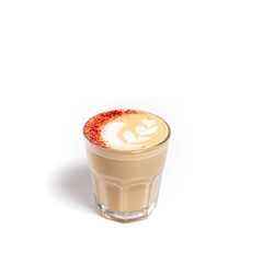 Cafe latte in a transparent glass coffee cup. The cup is on a white background