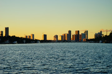 Obraz premium Miami downtown skyscrapers and beach at sun set