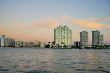 Miami downtown skyscrapers and beach at sun set	
