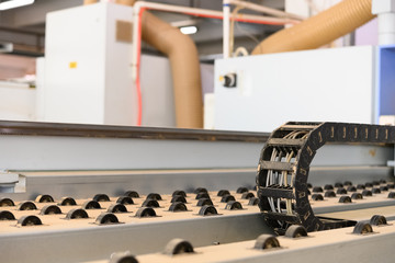 machine for handling plywood in a factory