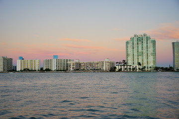 Fototapeta na wymiar Miami downtown skyscrapers and beach at sun set 