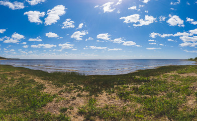 Sea shore. coastline panorama. seascape with horizon line. sky with clouds