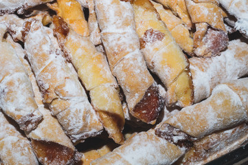 Crispy croissants stuffed with jam. traditional slavic pastry called roguelikes