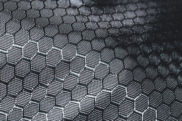 Fabric background with hexagonal cells. textile material