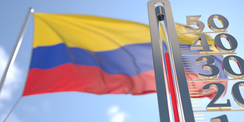 Thermometer shows high air temperature against blurred flag of Colombia. Hot weather forecast related 3D rendering