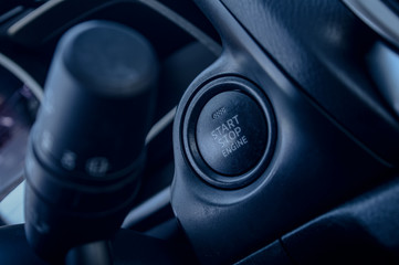 Electronic push to start ignition for a high end luxury vehicle. 