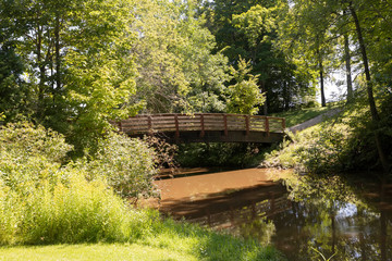 The bridge over creek in a city park
