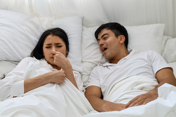 Fototapeta na wymiar Happiness young couple lover sleeping and relaxation on bedroom. 