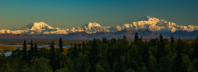 Denali, Mt Hunter and Mt Foraker in the alaska range.  Denali is the highest mountain peak in North America, with a summit elevation of 20,310 feet