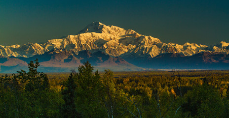 Denali in the alaska range.  Denali is the highest mountain peak in North America, with a summit elevation of 20,310 feet