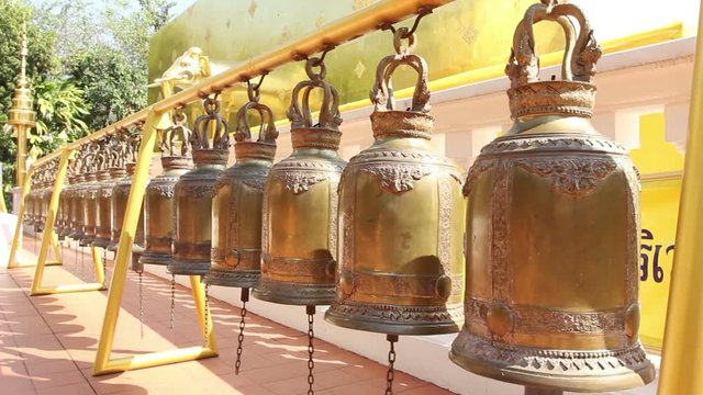 Row of golden bells at Wat Pho temple, Bangkok, thailand