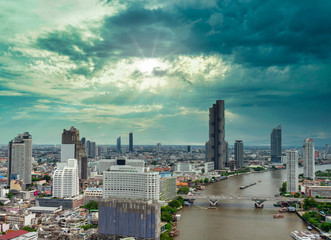Fototapeta premium Urban Bangkok view with beautiful cloud skyscape Background in the golden hour of Bangkok city, Thailand...