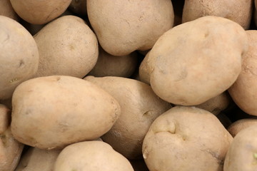 Potatoes. Texture vegetable white young potato.