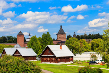Fototapeta na wymiar View of Monastery of Saint Euthymius and wooden houses in Suzdal, Russia. Suzdal cityscape