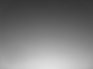 Abstract gray background with light. Black and white background.