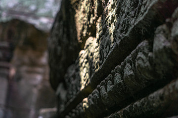 Angkor Wat, Siem Reap, Cambodia. March, 10, 2020: Hand-carved walls in Buddhist temple of Angkor Wat.