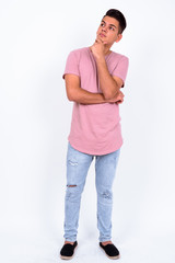 Fototapeta premium Portrait of young handsome multi ethnic man