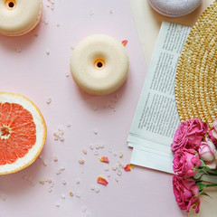 spa composition soap with salt bombs on a pink background, the concept of relaxation and body care