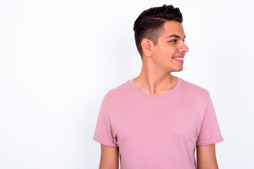 Obraz premium Portrait of happy young handsome multi ethnic man