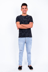 Portrait of happy young handsome multi ethnic man