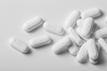 Paracetamol 500 mg on white background. Isolated paracetamol. White pills.