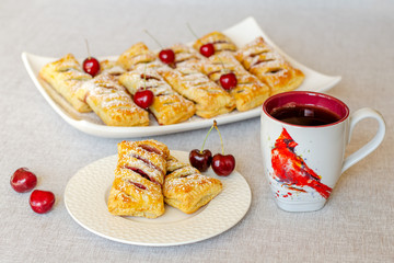 Oven baked puffs with fresh cherries