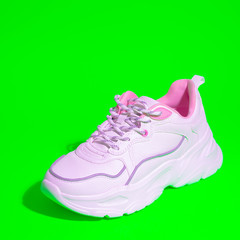 Trendy sport shoes. White sneakers. Minimal fashion design