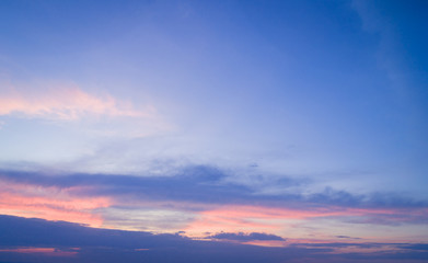Naklejka na ściany i meble Sunset sky with multicolor clouds