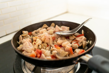 Homemade fried pork with tomato sauce for pasta.