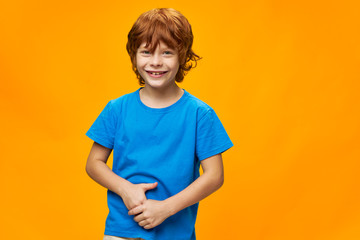 portrait of a red-haired child freckles cheerful smile
