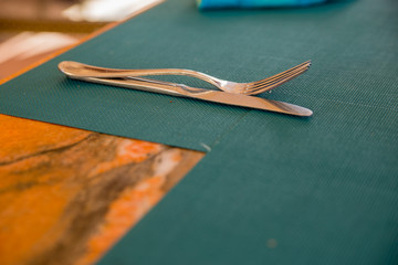 knife and fork on an empty table