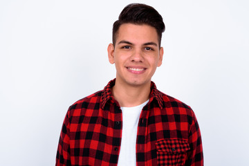 Portrait of happy young handsome multi ethnic hipster man