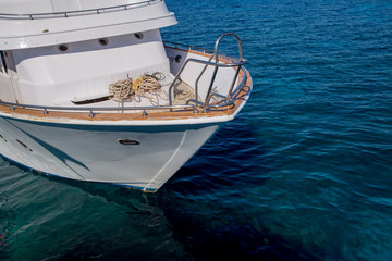 the bow of a beautiful yacht on sea water