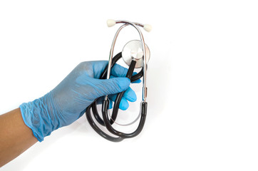 Hand in medical latex gloves holding stethoscope. Isolated on white.

