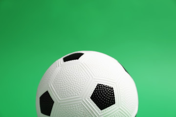 Soccer ball on color background