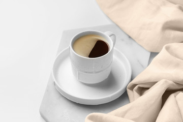 Cup of hot coffee on white background