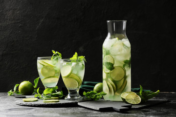 Glassware of fresh mojito on table