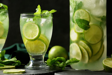 Glassware of fresh mojito on table