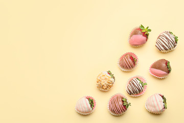 Tasty strawberry dipped in chocolate on color background