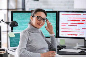 Female programmer working in office