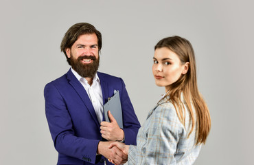 Congratulations. modern office life. successfully performed work. similarity of interests. legal lawyer agency. manager and boss with folder. shaking hands at work. business people at meeting